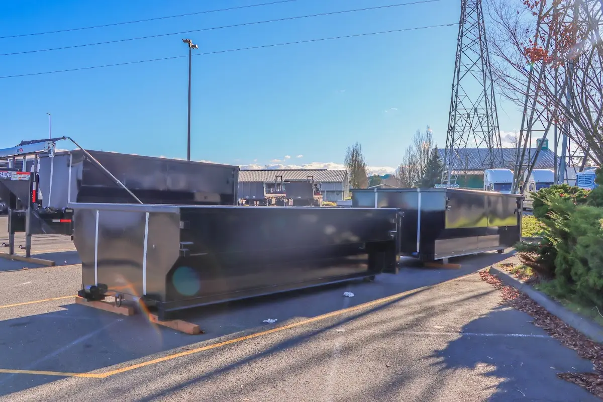 Roll-off dumpster ready for waste disposal at job site for 4 Yard Dumpster Rental in Owasso